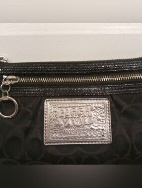 Cute Coach Black Wristlet from the Coach Poppy Line